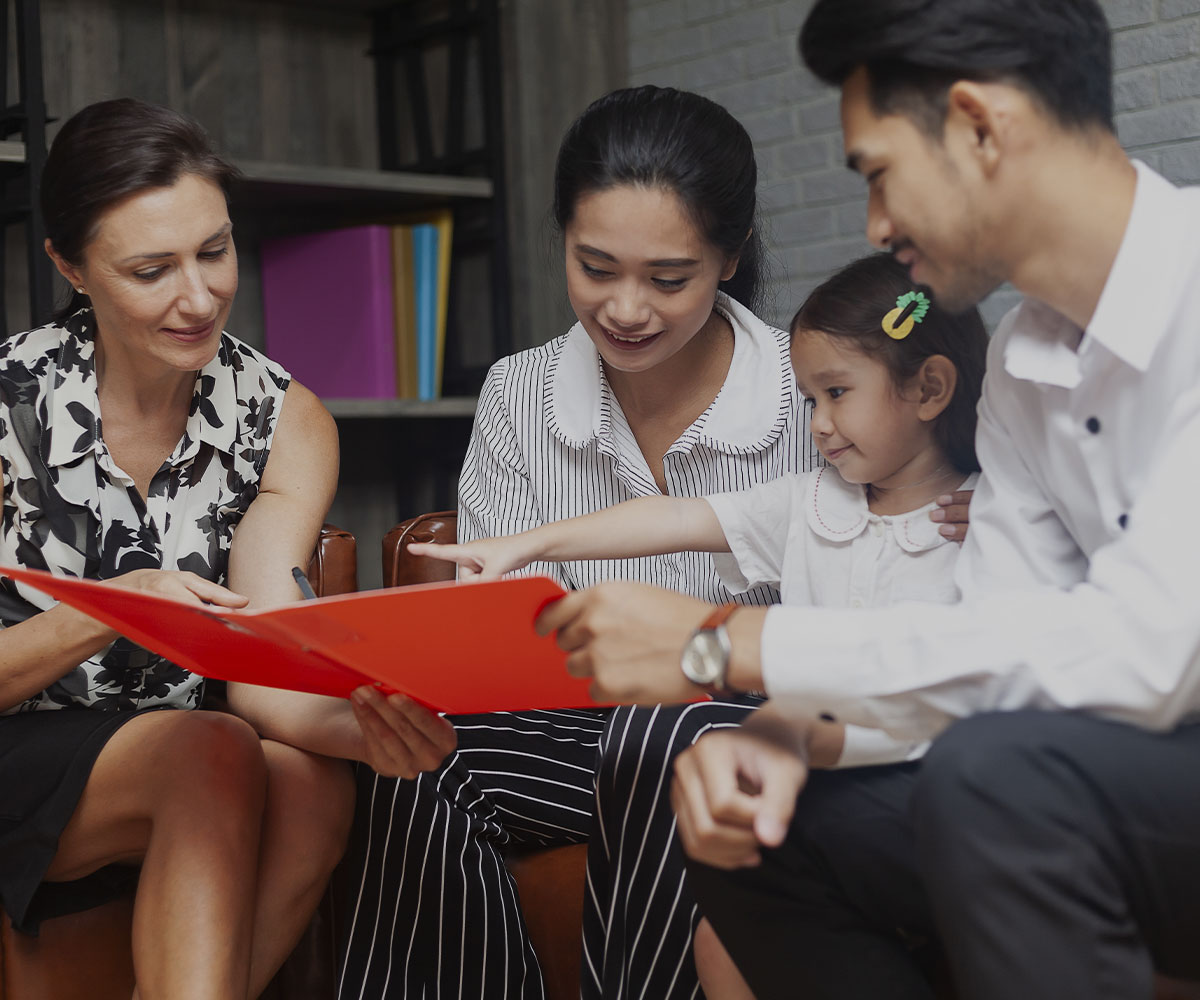 image of people signing a gestational contract